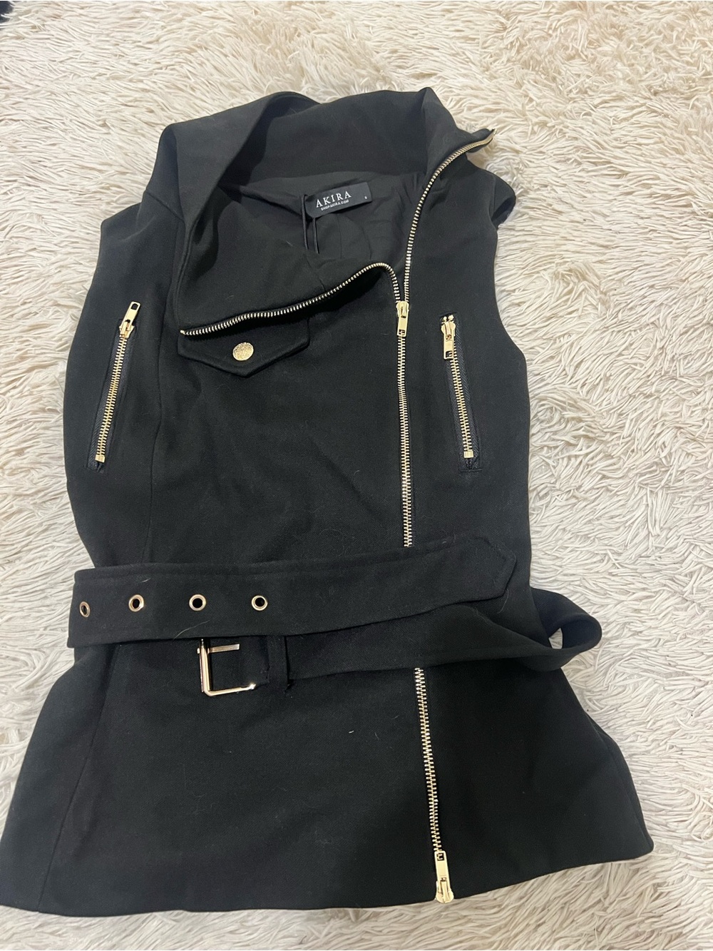 sleeveless black vest